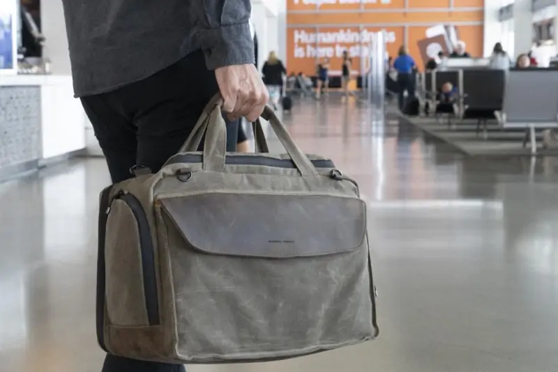 Man holding a Waterfield Air Duffel