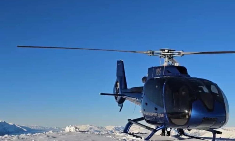 Heli landing in snow above Queenstown