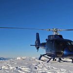 Heli landing in snow above Queenstown