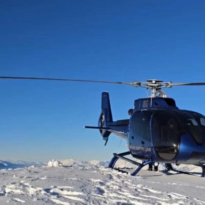 Heli landing in snow above Queenstown