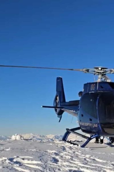 Heli landing in snow above Queenstown